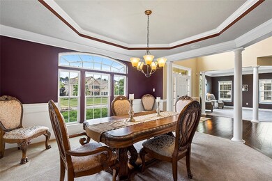 Dining area w/lovely tray insert ceiling to enjoy.
