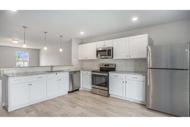 The kitchen and eat-in dining nook are an efficien