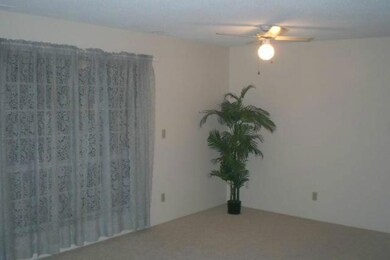 Living Room. Faces swimming pool