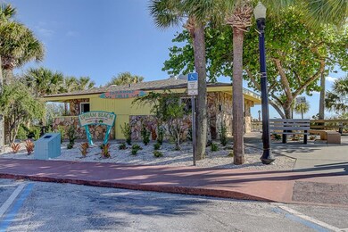 Paradise Grille and beach right across the street!