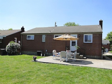 Newer and spacious exposed aggregate patio overloo