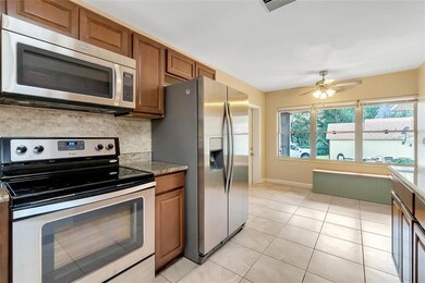 Kitchen with granite counters and stainless appliances 