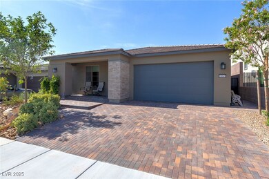 View of front facade featuring stucco siding, an a