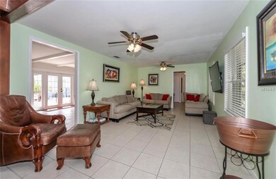 LIVING ROOM WITH TILE FLOORING