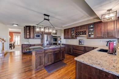 Updated kitchen w/stained maple cabinetry, Cambria