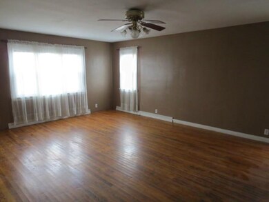 Living Room. Wonderful size windows.