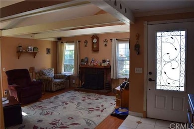 Living Room with Fireplace, vaulted ceilings, wood