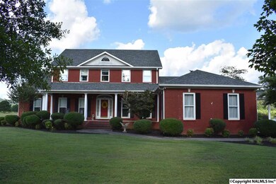 Brick Two Story with 3 Bedrooms, 2 Full Baths and 2 Half Baths.