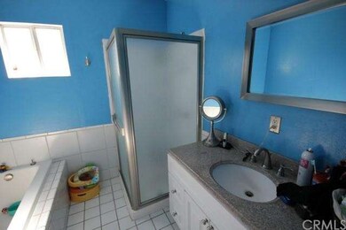 Remodeled bathroom with new bath tub, granite coun