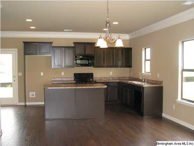 Open kitchen with island-  great for small family 