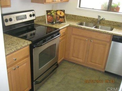 Remodeled kitchen with stainless steel appliances.