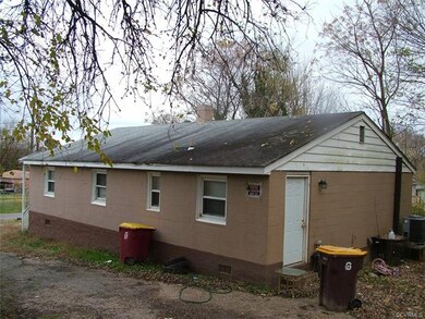side view, rear entrance enters kitchen
