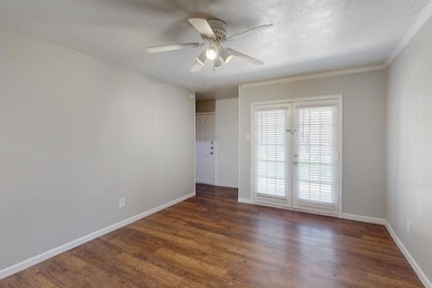 Unfurnished room featuring wood finished floors, a