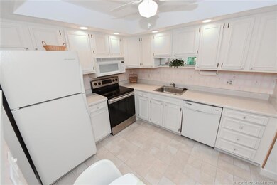View of the Kitchen - Immaculate, Bright, White an