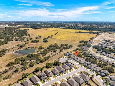 View of property location featuring nearby suburb