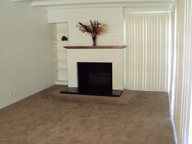 LIVING ROOM WITH FIRE PLACE