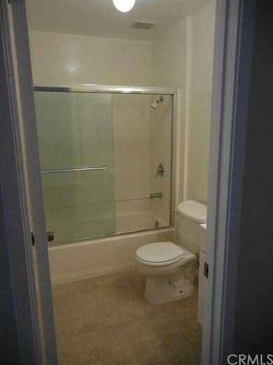 New porcelain tile in each bathroom.