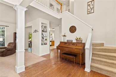 Freshly painted with an open foyer with hardwoods and open concept to dining room and living room, great for entertaining