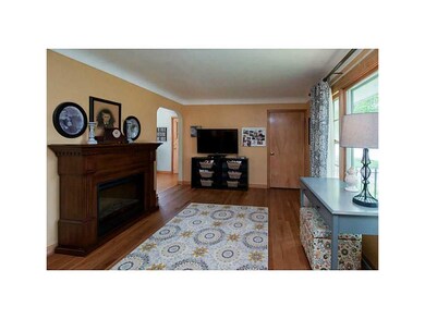 Living Room. Electric fireplace will stay.