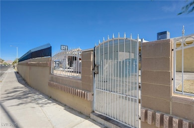Side gate with electronic keypad and fenced front