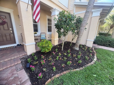 Front grass and flower garden