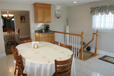 Kitchen looking at open Staircase