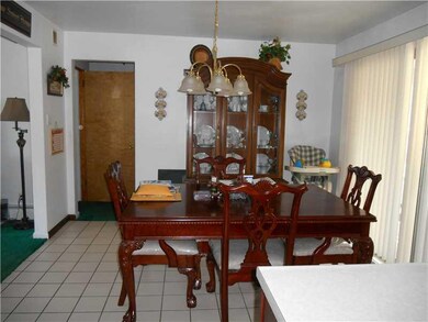 Dining Room. The glass sliding door leads to the p