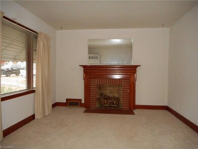 Living Room: Room features include soft thick carpet flooring, three windows for natural lighting and a gas log fireplace for extra heat on those cool evenings or maybe just for a nice cozy place to relax after a busy day.