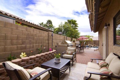 Additional side patio with BBQ and seati