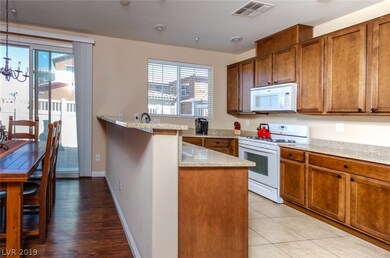 Kitchen with granite countertops and a granite bre