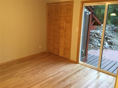 Main Floor master bedroom suite has sliding glass