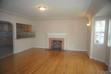 Living room in main house with fireplace