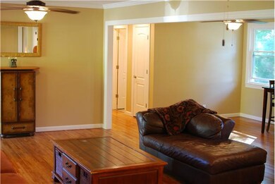 Living room and partial view of dining area