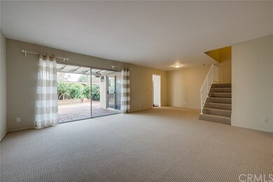 Living Room which opens to large brick patio, Dini