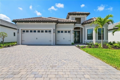 Mediterranean / spanish-style house with an attach