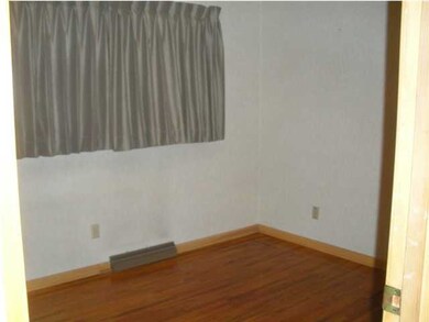 Bedroom #2 10'5x9 with original hardwood floors