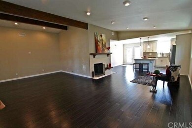 Living room opens up to Dining area and kitchen