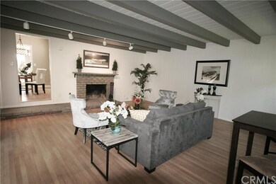 Cozy fireplace is a focal point of the spacious fa