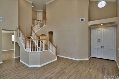 Traditional staircase with oak handrails and white