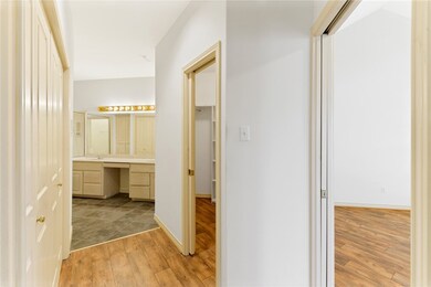 Master Suite, entry to bedroom on the right, entry to walk-in closet and closet on the left.