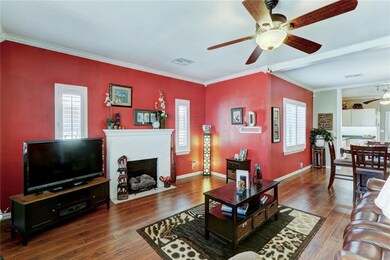 Living room with view of dining room.