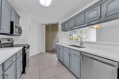 3100 N Pine Island Rd unit 304, Sunrise, FL 33351 - photo 3