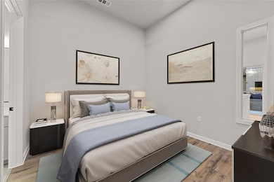 Bedroom featuring light wood-style floors