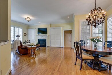 Breakfast Room -  • Overlooks the pool & patio area• Door to Grilling Area •Hardwood Floors•Open Concept with Family Room •Plantation Shutters •Crown Molding•