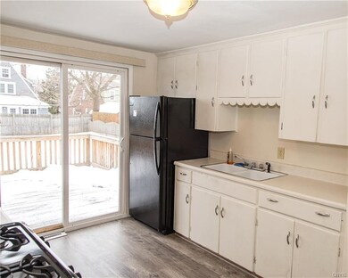 Bright kitchen with lots of storage and a new slid
