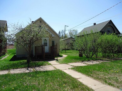 View of property exterior featuring a yard