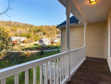 Nice covered front porch with pretty views