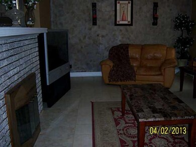 Living Room. 22 FT LIVING ROOM....WOOD BURNING FIR
