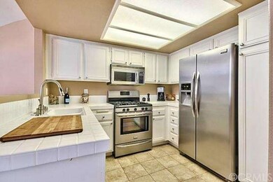 Easy care tile floors, nice size pantry.  Stainles