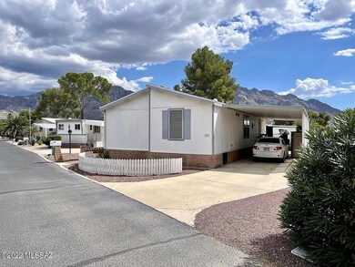 Front with carport